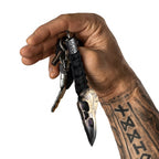 Wikinger Schlüsselanhänger Raven Skull kaufen – Raben-Schädel Odin in tätowierter Wikinger-Hand